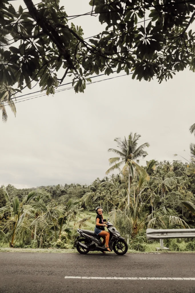 renting scooter Bali helmet tourist